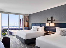 Modern and inspiring hotel room at the Loews Kansas City Hotel for NAAAP Leadership Convention attendees.