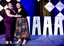 Group 363 Recipient accepting an award at the prestigious NAAAP Awards ceremony during the Leadership Convention.